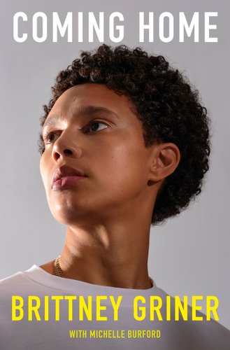 Coming Home by Brittney Griner, book cover. Close up on Brittney's face as she wears a plain white t-shirt and turns her head to the left, looking up towards something. She has a mini afro and stands in front of a gray background.