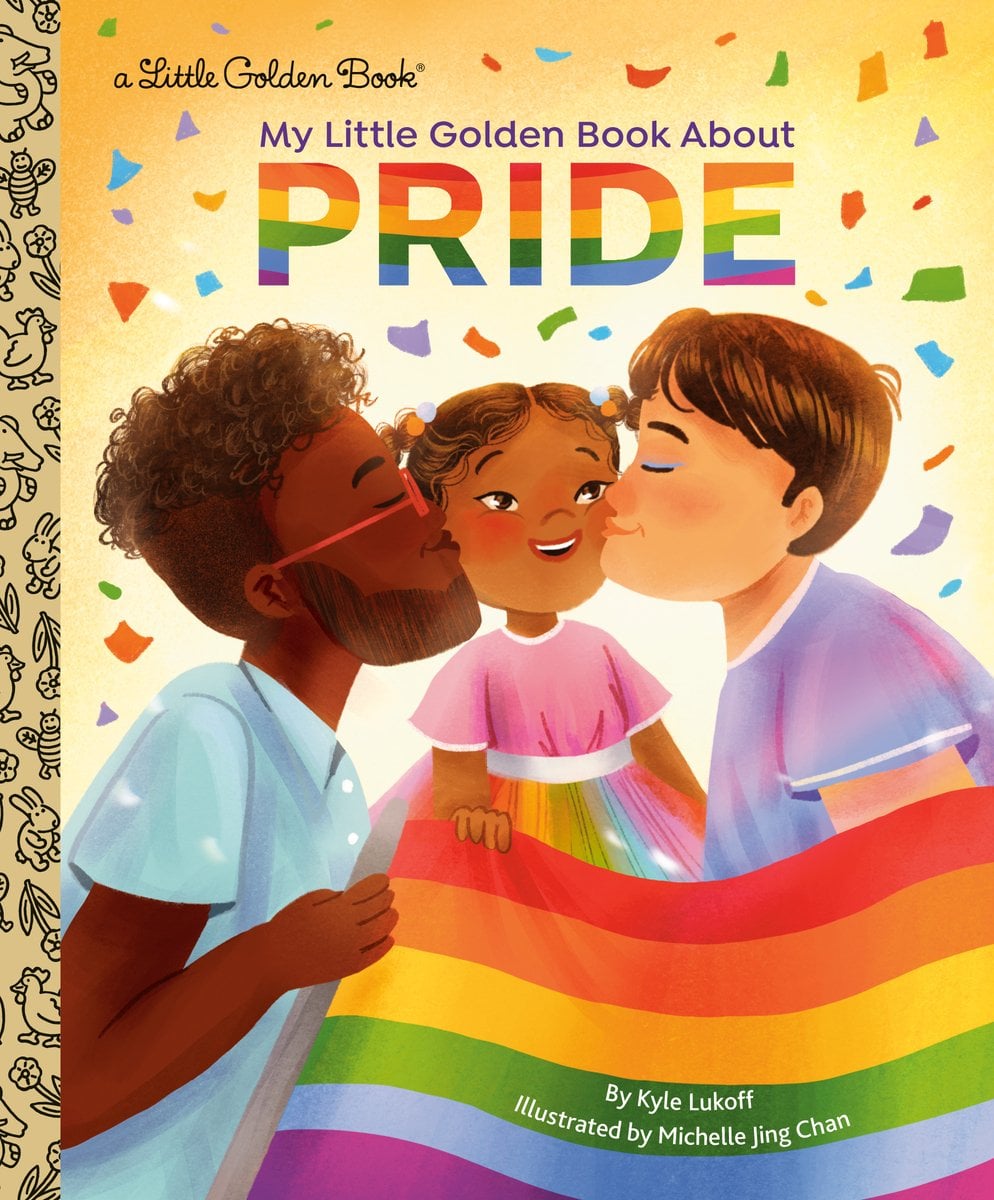 Book cover of My Little Golden Book About Pride by Kyle Lukoff, Illustrated by Michelle Jing Chan, featuring a brown-skinned child with curly brown hair in pigtails being kissed on either cheek by two adults - one brown-skinned with short, brown curly hair, and the other light-skinned with short, straight brown hair, as all three hold up a rainbow flag.