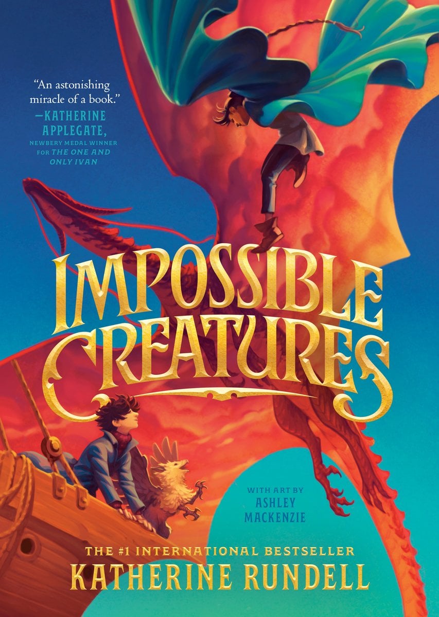 Impossible Creatures by Katherine Rundell middle grade book cover depicting a red dragon against a blue sky. In the silhouette of the dragon's wings is a young boy with a baby griffin riding in a boat and a young girl jumping down with a green cloak waving in the wind behind her.