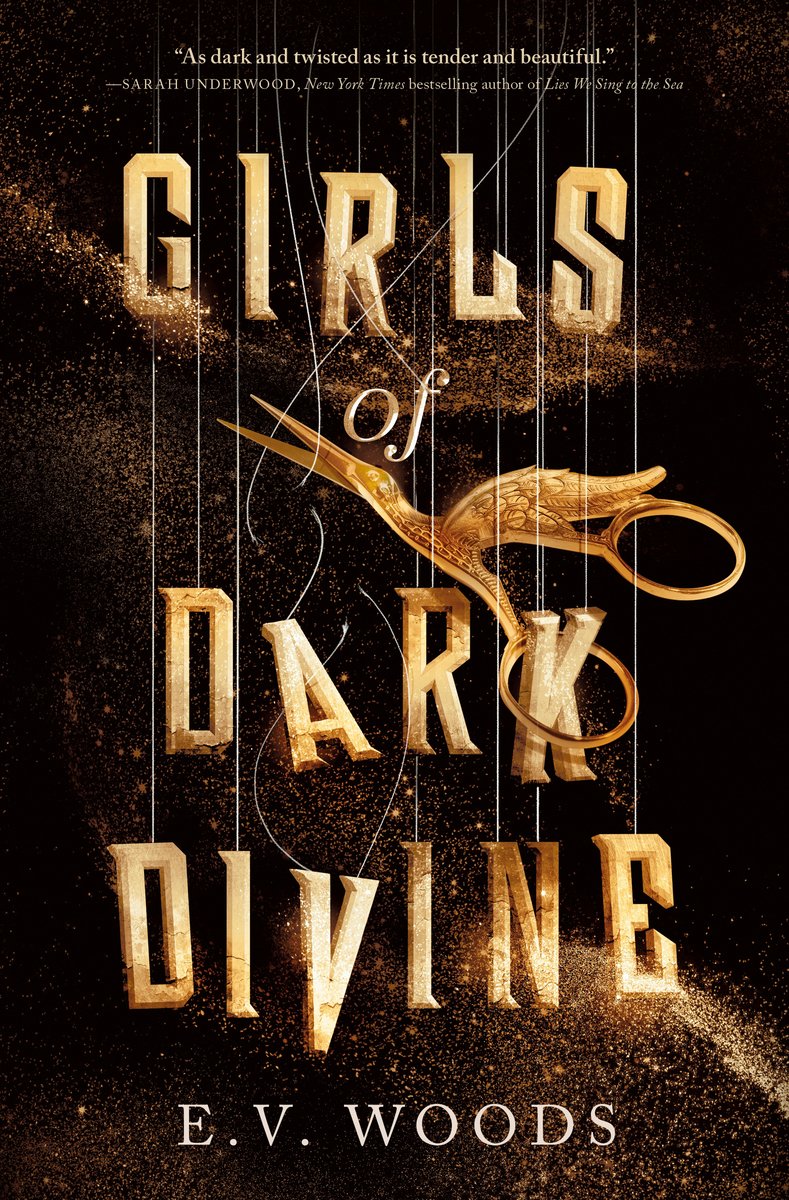 Book cover for Girls of Dark Divine by fantasy author E.V. Woods. The letters hang from strings and a pair of gold scissors is poised to cut them.