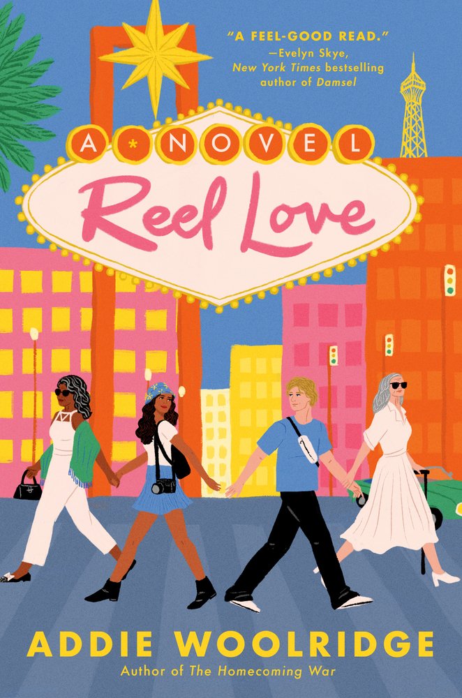Book cover of Reel Love by Addie Woolridge. There are four characters on the cover. The boy and girl are holding hands while being led in opposite directions by their grandmas. A cartoonish Vegas is behind them.