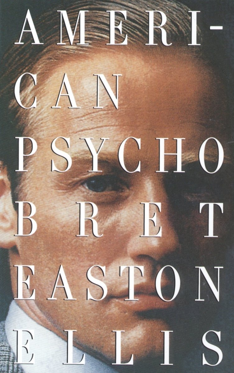 Large, white title words cover in white cover a man's face, which is set as the background of the cover. The author's name is under the title in the large, white lettering.