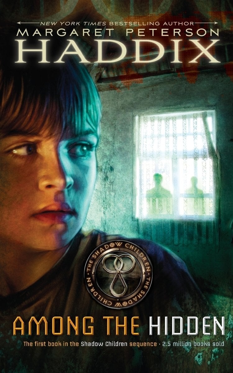 Cover of Among the Hidden by Margaret Peterson Haddix. A girl is closer to the front of the cover, looking over her shouldered to a barred window. In the window is two silhouettes.
