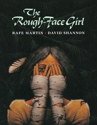 A young girl with feathers in her hair and wearing a tattered brown top holds up her bandaged hands to her face, with one eye peeking through her fingers. The title sits at the top in large, light blue-white letters. The author's name sits below the title in small, blue-white letters. Everything is set against a black background.