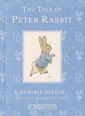 The Tale of Peter Rabbit by Beatrix Potter. Book cover depicting a blue clothbound book with the initials PR repeated in faded white, cursive writing, along with the silhouette of a root vegetable. In a white square in the centre is an illustration of a little brown rabbit with a wite cotton-tail, wearing a blue shirt jacket.