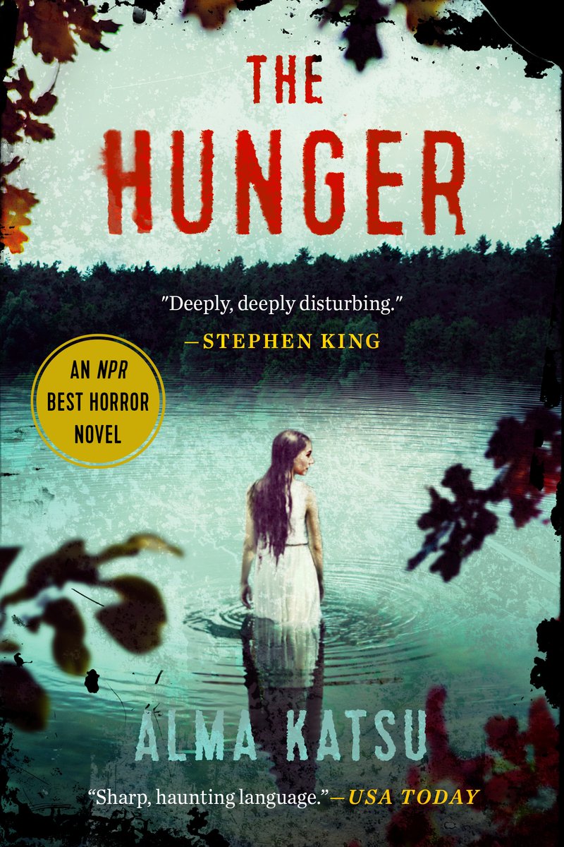 The Hunger by Alma Katsu, a blue-hued cover of a girl in a lake facing away from the audience. Leaves are covering the edges of the cover.