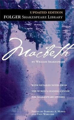 The book cover for Macbeth by William Shakespeare. A painted purple and blue background with dark purple and dark blue dripping paint at the top. The title is in white cursive text.