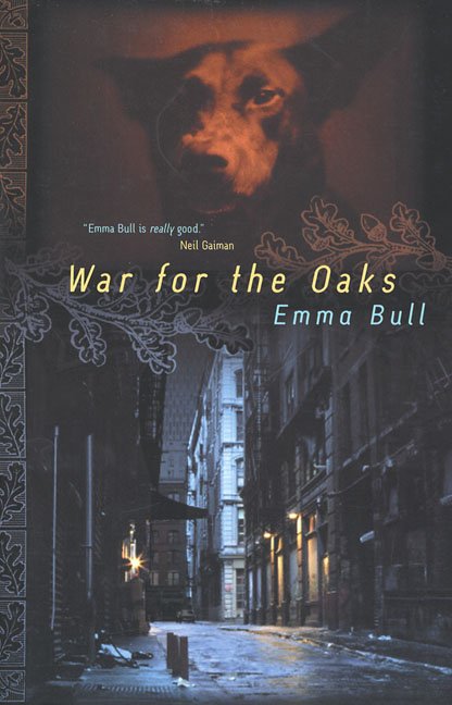the cover of Emma Bull's War for the Oaks, with the image of a dark city street on the bottom and a snarling dog at the top