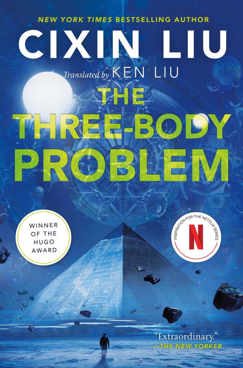 In various shades of blue and white a scene of an alien entity settling on a pyramid in the foreground with rocks floating around and a silhouette of a person in the foreground. "Cixin Liu" is written at the top in white and the title "The Three-Body Problem" written in green underneath it.