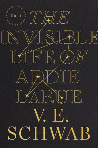A black book cover with golden words that say "The Invisible Life of Addie LaRue" and star patterns.
