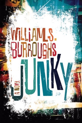 Junky: A Novel by William S. Burroughs in large centered text across a black, yellow, and blue background.
