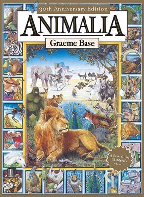 Book cover of "Anamalia" by Graeme Base, featuring a male lion laying in the foreground, with many animals such as a fox, a male peacock, a tiger and more, behind him; the cover is surrounded by vingettes of more animals.