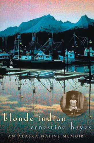 Blonde Indian by Ernestine Hayes cover; harbor in front of snow-capped mountain range during evening with personal photo of Hayes above title