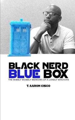 A man in Black and white sits beside a small blue box resembling the Tardis from the British television show, Doctor Who. Beneath the image of the man and blue box is the title in large, black and blue letters. The author's name is in smaller black letters. Everything is set against a gray-white dual color background.
