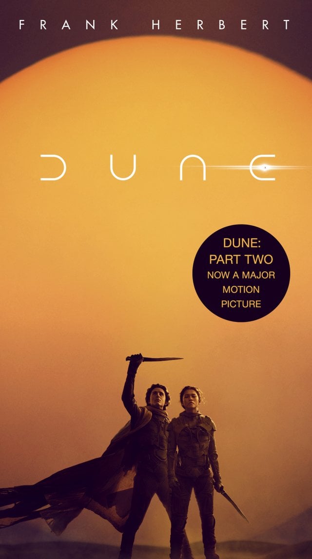 Dune: Part Two directed by Denis Villeneuve based on the novel Dune by Frank Herbert, science fiction cover depicting an orange background Chani and Paul holding up a knife in the air.