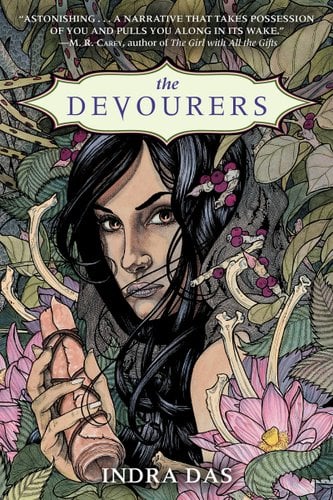 Book cover of The Devourers by Indra Das. Shows a woman's face amongst flowers and bones.