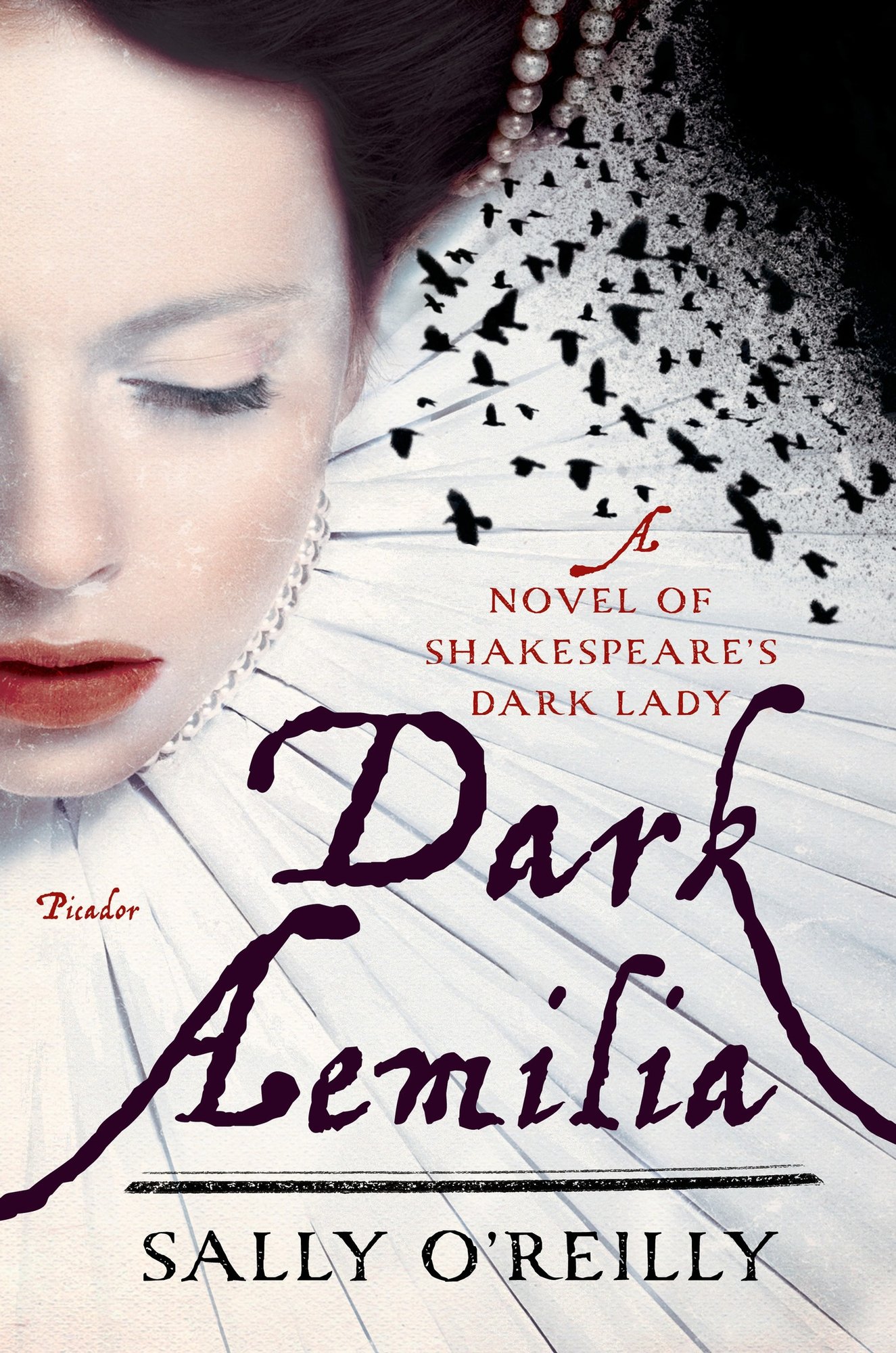 Dark Aemilia by Sally O'Reilly, a historical fiction book cover depicting a close-up of a woman’s face that fills a third of the cover. Her skin is fair, lips subtly red, and her eyes are cast downward in a contemplative gaze. On the right side of the cover, a white, pleated ruff-style collar radiates from the lower center. Above the collar and sweeping across the upper right are a flock of small black birds in silhouette taking flight.