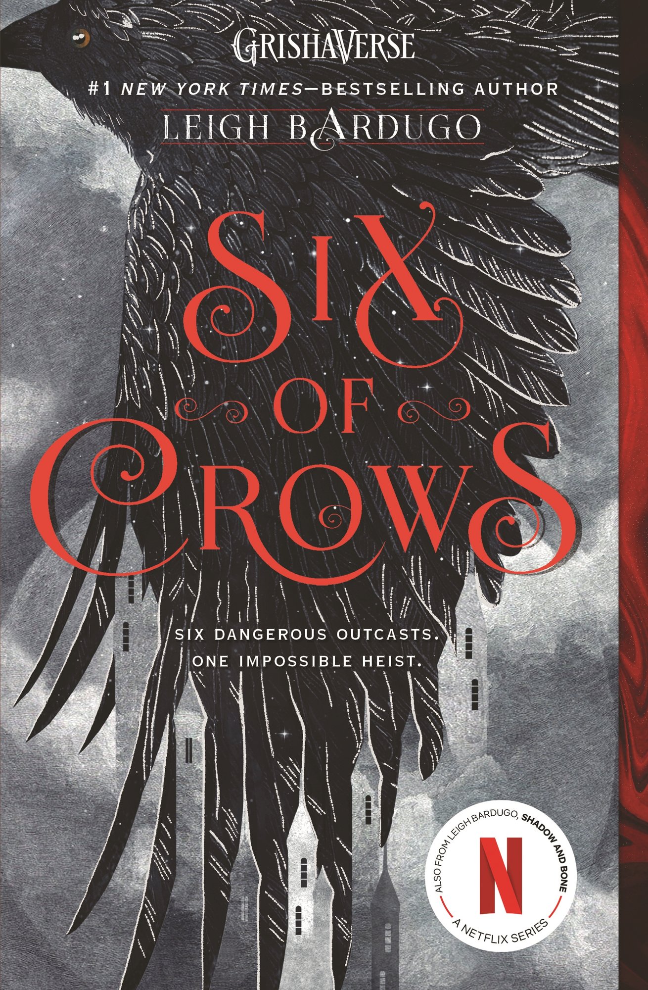 Book cover for Six of Crows by Leigh Bardugo, the first in the Six of Crows duology. A black crow flies amidst a gray cloudy sky, its wing serving as a background for the title in red, looping text and partially concealing a white building. The author's name is in white.