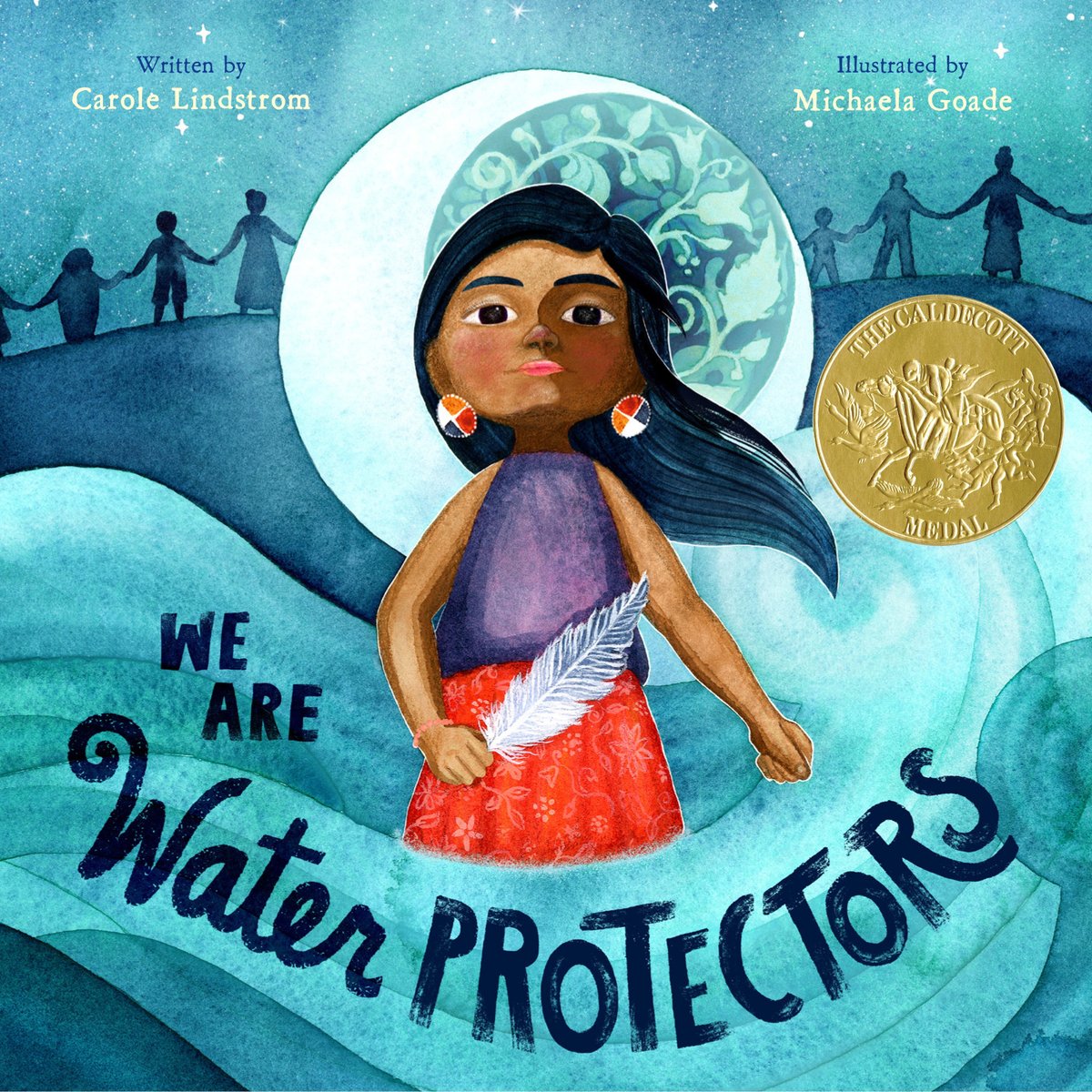Book cover of We Are Water Protectors by Carole Lindstrom, Illustrated by Michaela Goade, featuring a brown-skinned child with long dark hair holding an eagle feather in one hand and making a fist with the other; swirling, water-like shapes surround her; a crescent moon frames her head; silhouetted human figures hold hands in a line in the background.