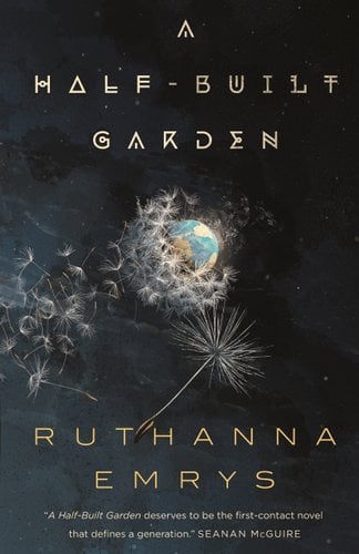 A dark background and in the centre is the earth covered by dandelion petals. Cover of "A Half-built garden"