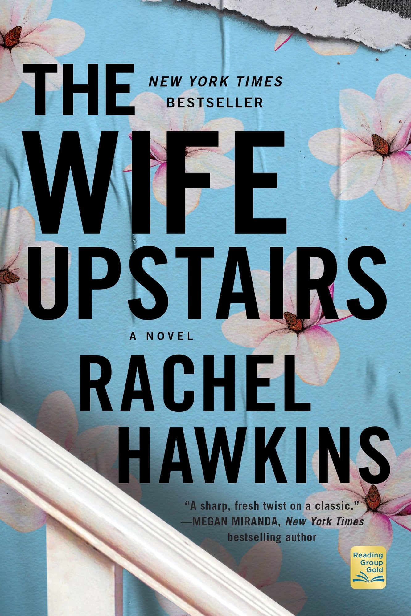 The Wife Upstairs by Rachel Hawkins, a thriller book cover depicting blue wallpaper with pink flowers on a staircase with the title and author name in black.