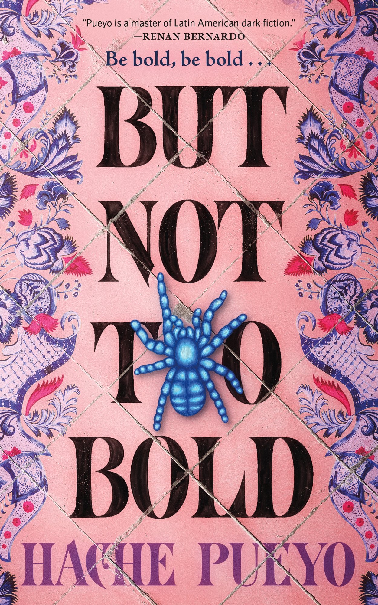The book cover for But Not Too Bold by Hache Pueyo. Square pink floor tiles with blue and red floral and paisley designs on the edges. In the center, the title is in large black text with a blue spider replacing the first "o" in "too."