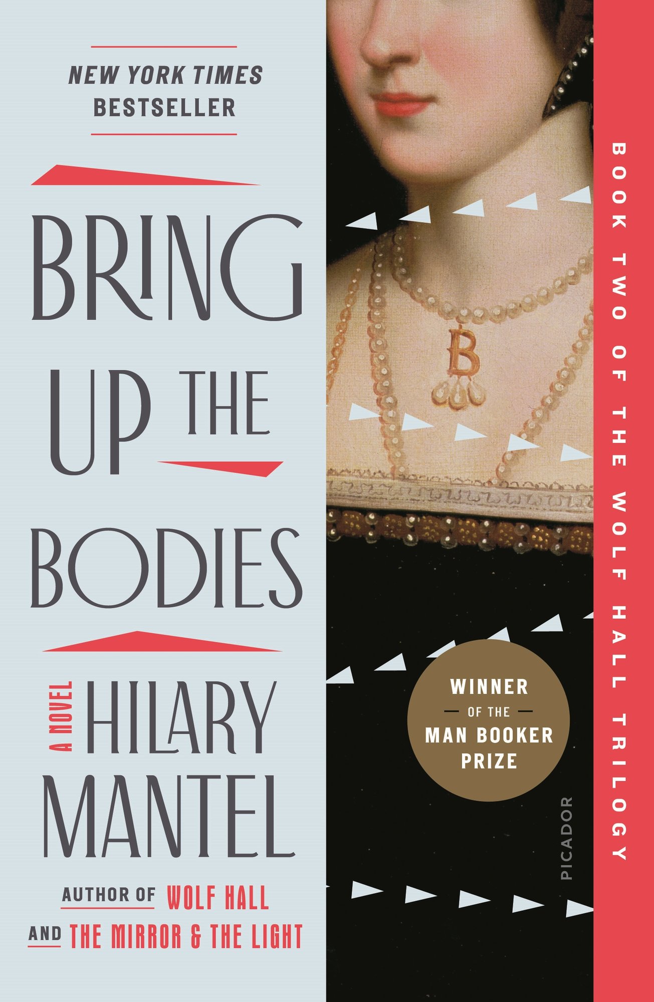 Bring Up the Bodies by Hilary Mantel book cover depicting a light blue left half with the title and author mentions. On the right is a portrait of Anne Boleyn dressed in a black dress with lacy trim and a necklace with the letter B.
