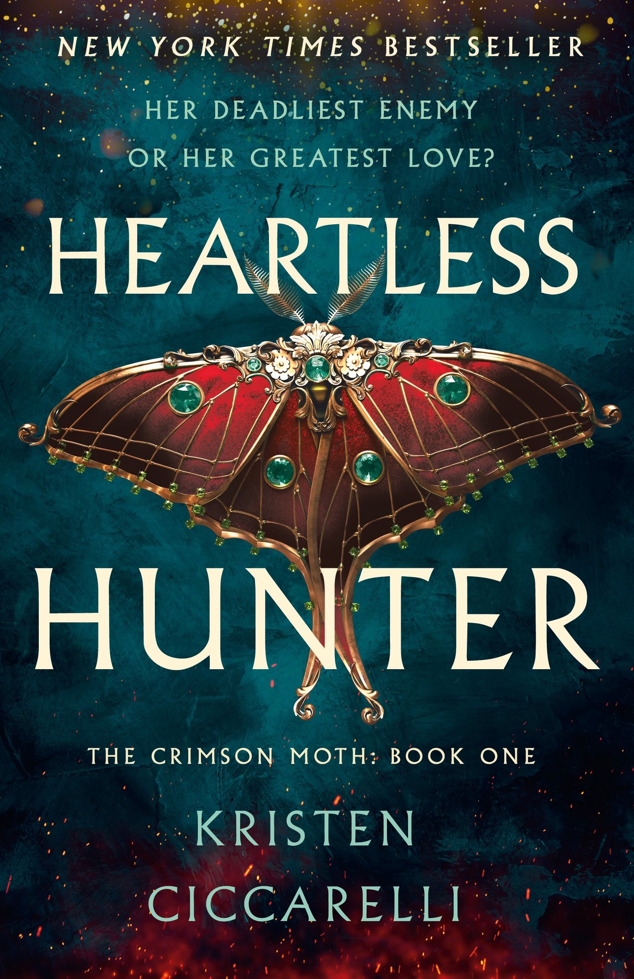Book cover for Heartless Hunter by Kristen Ciccarelli, the first in The Crimson Moth duology. The cover is dark blue with a shimmering gold border with a metallic red and gold moth inlaid with green gems in the center. The title is in white and the author name and the words "Her deadliest enemy or her greatest love?" are in light blue.