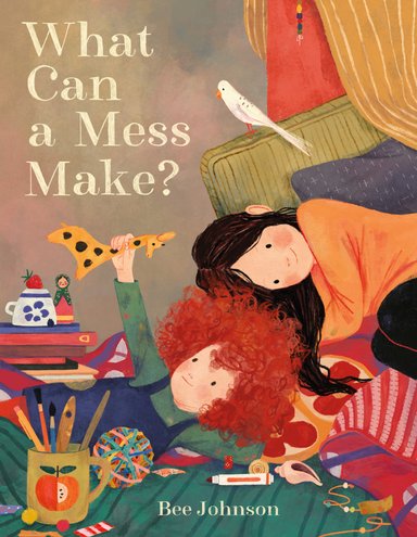 Book cover of What Can a Mess Make? by Bee Johnson, featuring two light-skinned children - one with long, straight, dark hair and one with long, curly red hair - cuddling crown-to-crown on a pile of blankets, pillows, and scattered art supplies.