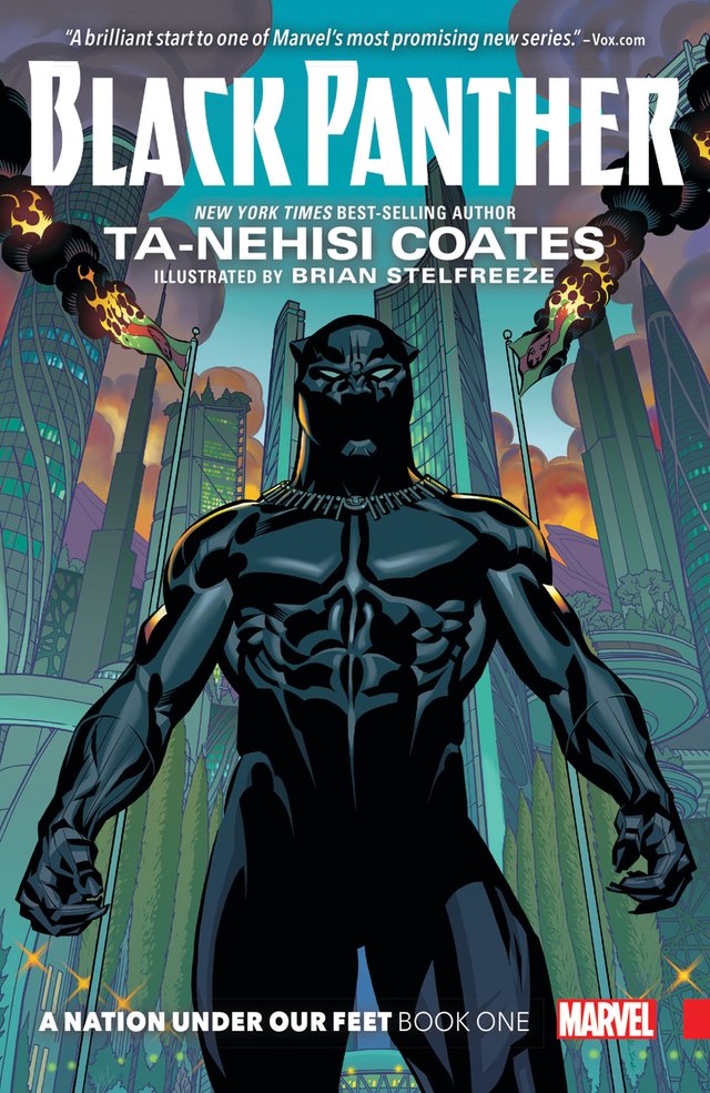 A figure in a full black suit and mask is standing with a cityscape in the background. Included in the skyline are two flags on fire.