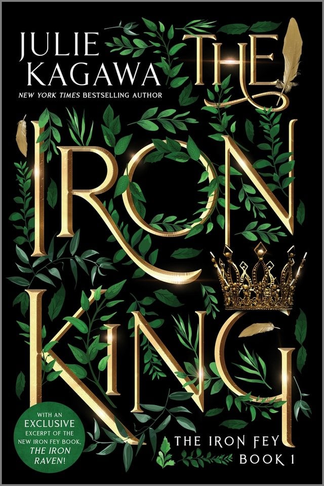 Cover of The Iron King by Julie Kagawa. The title is in gold text. There is a gold crown on the "G" and a feather on the end of the first word. Green leaves line the letters. Everything is placed against a black background.