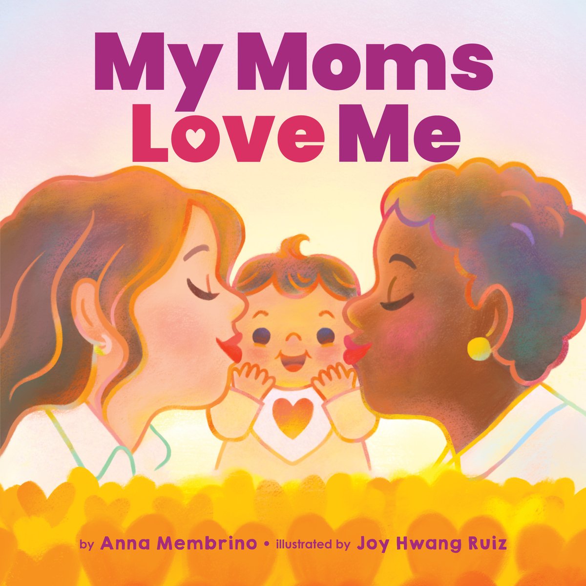 Book cover of My Moms Love Me by Anna Membrino, Illustrated by Joy Hwang Ruiz, featuring two women - one light-skinned with long, wavy dark hair and one brown-skinned with short, curly dark hair - kissing either cheek of a grinning light-skinned toddler with short dark hair.
