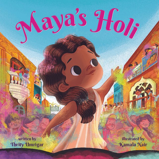 Maya's Holi by Thrity Umrigar, book cover. A young girl is surrounded by colorful powder and bright buildings, filled with people standing in their balconies watching the celebration.
