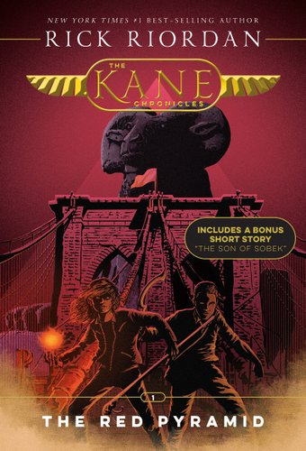 "The Kane Chronicles: The Red Pyramid" book cover with two young people standing in front of a tall wooden arced structure with a stature on top and a pyramid in the back with a red background.