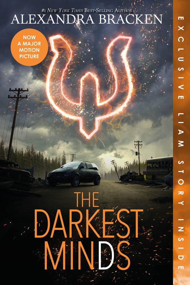 The Darkest Minds by Alexandra Bracken, book cover. Background is an abandoned neighborhood street with a car and a dark cloudy sky. An orange, glowing trident symbol is in the top center of the cover.