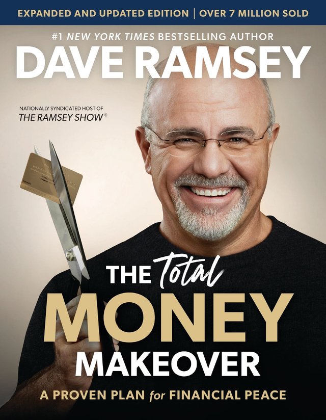 The Total Money Makeover by Dave Ramsey, financial literacy book cover depicting author Dave Ramsey cutting a card with scissors.