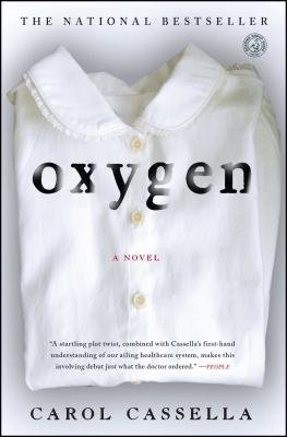 A folded white shirt has "Oxygen" written on it in Black, the author's name "Carol Cassella" written at the bottom.