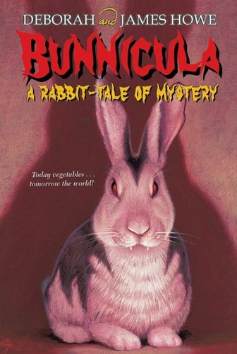 "Bunnicula: A Rabbit-Tale of Mystery" by Deborah And James Howe book cover of a rabbit looking like a vampire with two little fangs coming out of its mouth and frowning eyes. A big shadow covers most of the cover,
