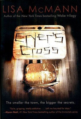 Cryer's Cross by Lisa McMann book cover featuring a worn-out classroom desk with the book title carved on the table.