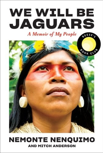 We Will Be Jaguars by Nemonte Nenquimo and Mitch Anderson, book cover. Close-up image of activist Nemonte Nenquimo facing forward but looking up with her traditional Indigenous makeup, jewelry, feathered headband, and attire.