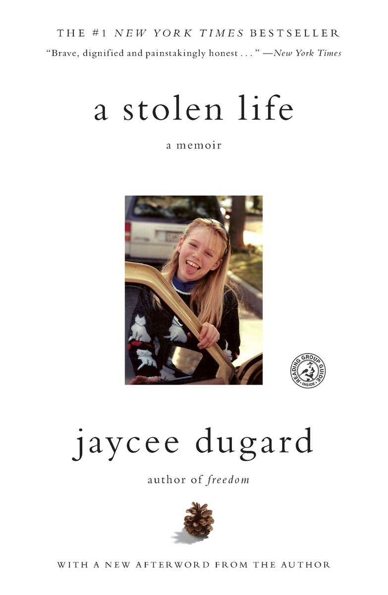 A Stolen Life by Jaycee Dugard. The cover is light yellow with a picture of the author as a young girl in the center.