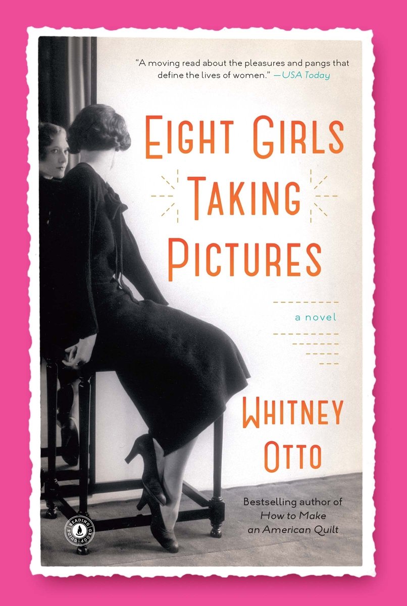 Eight Girls Taking Pictures by Whitney Otto. A pink border surrounds a black and white image of a woman looking back at herself in a mirror, alongside orange title and author text.