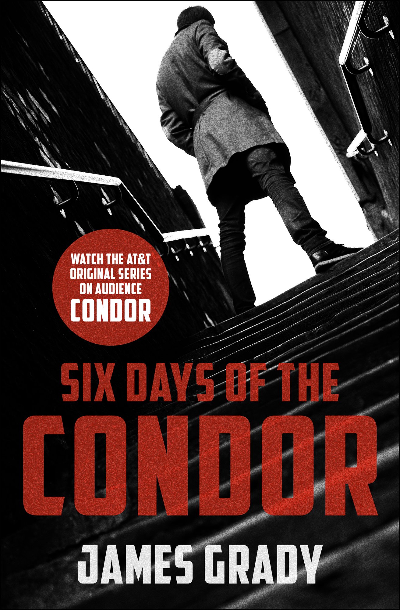 Six Days of the Condor by James Grady book cover depicting a man standing at the top of a stairs in black and white.
