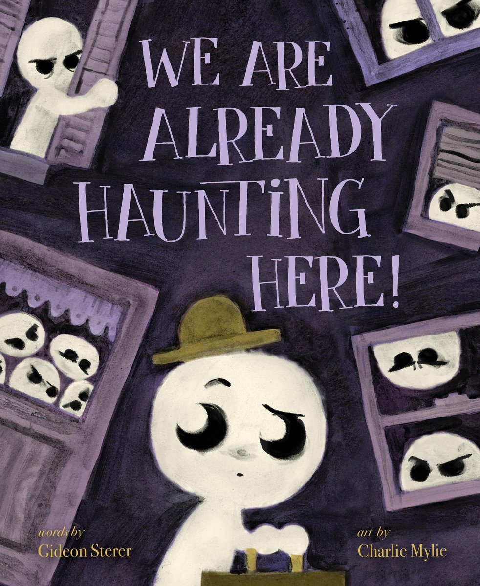 Book cover of We Are Already Haunting Here! by Gideon Sterer, Illustrated by Charlie Mylie, featuring an uncertain ghost wearing a brown bowler hat and carrying a suitcase; behind the ghost are several menacing-looking ghosts peering through windows.