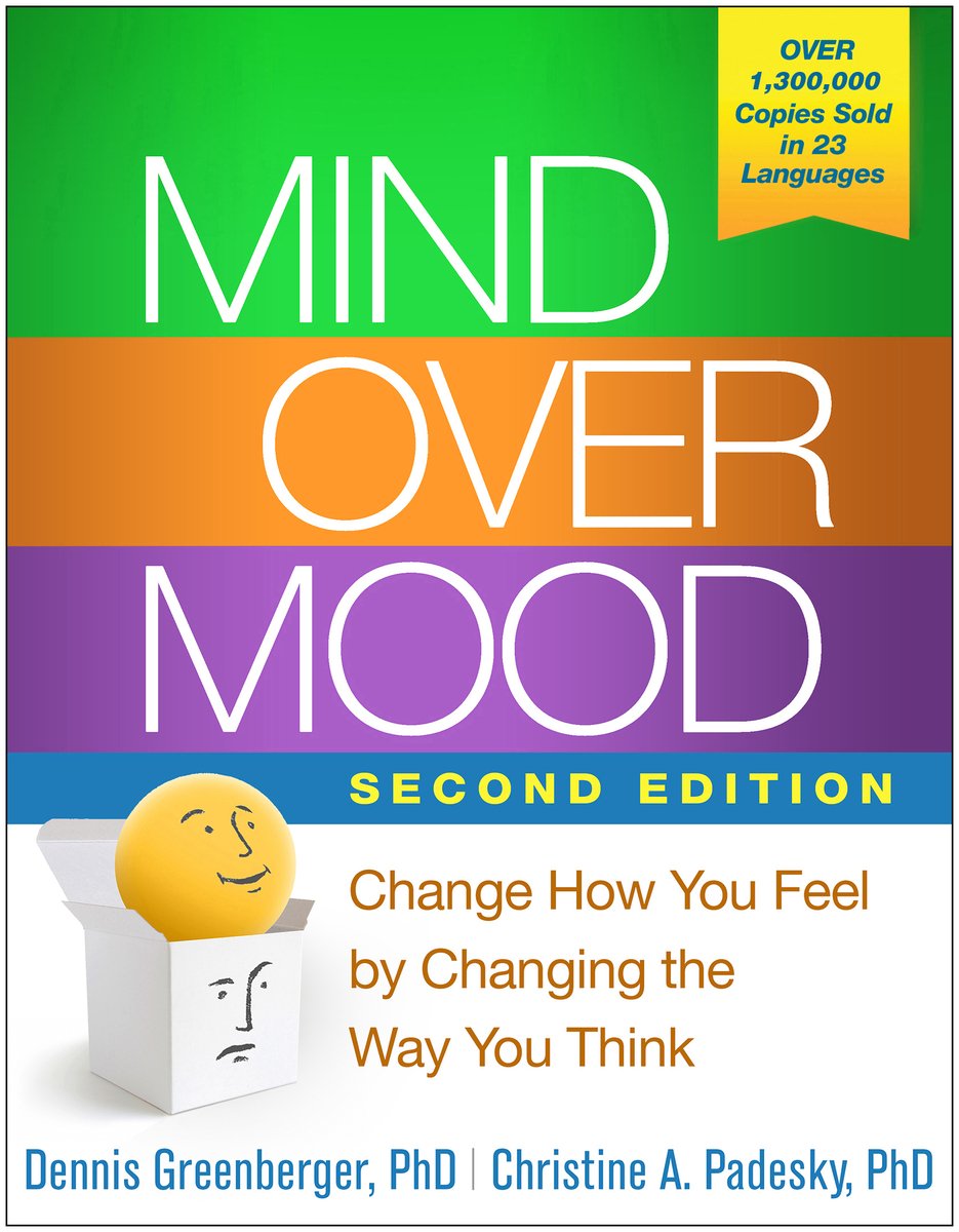 Cover of Mind Over Mood by Dennis Greenberger and Christine A. Padesky. There is a green line, then orange, then purple, then blue and the bottome is white. There is a white box with a sad face and a yellow ball coming out of it with a happy face.