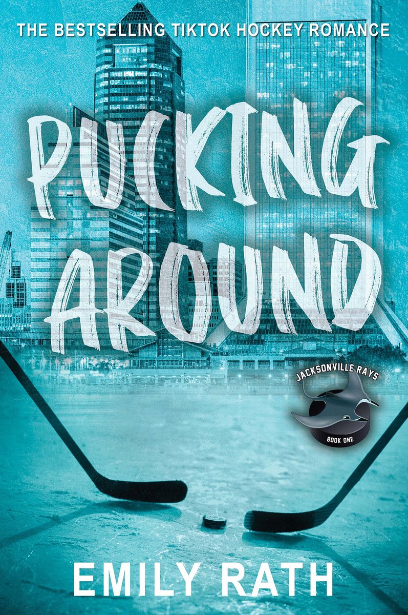 Pucking Around by Emily Rath book cover features features a sports-themed visual: prominently displayed are two crossed hockey sticks with a puck between them. The background has a teal-blue hue with faint textures or elements evoking an ice rink or cold arena setting (for example a subtle rink graphic or lighting). The title “PUCKING AROUND” is written in a large, hand‐brushed or somewhat rough white font that feels dynamic and informal, giving it a casual, bold energy. The author’s name, Emily Rath, appears below the title in a simpler, smaller font, maintaining readability without distracting from the main image.