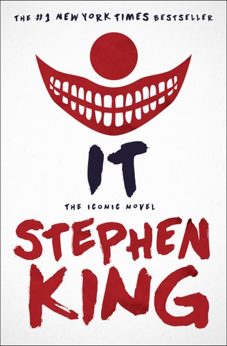 "It" by Stephen King, book cover of a clown's red nose and smiling sinisterly with the title and author's name written with a marker.