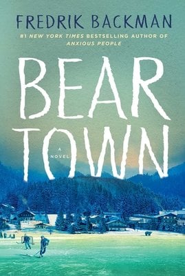 A grey-teal book cover depicting a hockey rink with a town behind it on the bottom half of the cover. It says "Beartown" in the middle.