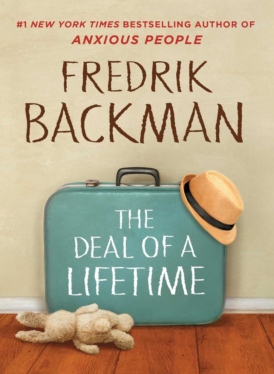 The Deal of a Lifetime, by Fredrik Backman, a short story. The cover is off-white with a blue suitcase and a hat laying on it, and a bunny stuffed animal laying baside it.