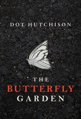 Book cover for "The Butterfly Garden" by Dot Hutchison. Black textured background resembling cracked, dry earth or asphalt. A single white butterfly with delicate wing details is positioned in the center. The author's name appears in white text at the top, and the title "THE BUTTERFLY GARDEN" is below the butterfly image, with "BUTTERFLY" in red text and "GARDEN" in white.